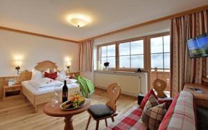 TV i/ili multimedijalni sistem u objektu Hotel Ritterhof Ellmau