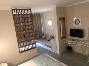 TV a/nebo společenská místnost v ubytování Hotel La Residence Hammamet