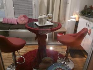 A seating area at EcoHouse & BioVeg Café