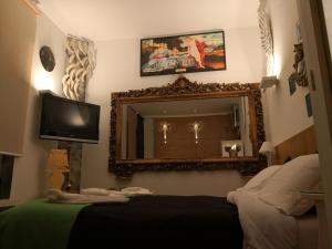 A television and/or entertainment centre at EcoHouse & BioVeg Café