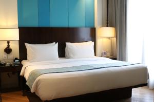 
A bed or beds in a room at Holiday Inn Resort Bali Benoa, an IHG Hotel - CHSE Certified
