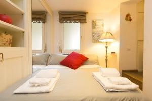 Posteľ alebo postele v izbe v ubytovaní Pantheon Romantic Loft