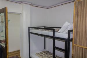 Postel nebo postele na pokoji v ubytování Comfort Stay Hostel