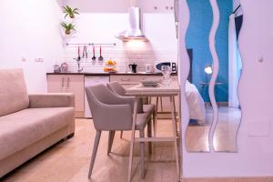 Kuchyňa alebo kuchynka v ubytovaní Málaga Central Suites