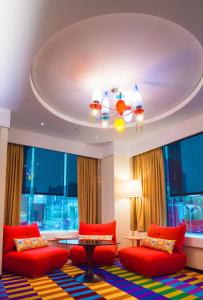 Postel nebo postele na pokoji v ubytování Green World Hotel - Zhonghua