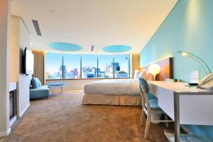Postel nebo postele na pokoji v ubytování Green World Hotel - Zhonghua