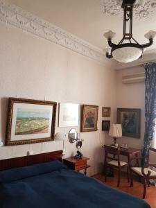 Postel nebo postele na pokoji v ubytování Hotel Cronstadt
