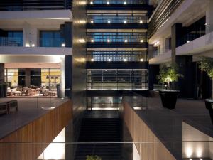 a view of the lobby of a building at The Met Hotel Thessaloniki, a Member of Design Hotels in Thessaloniki