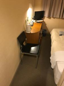 Postel nebo postele na pokoji v ubytování Business Hotel Goi Hills