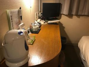 TV a/nebo společenská místnost v ubytování Business Hotel Goi Hills