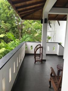 Balkón nebo terasa v ubytování Unawatuna Beach Bungalow -