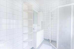 Ett badrum på City Apartments in Jonkoping