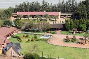 an aerial view of a building with a garden at The Falls Guest House in Augrabies