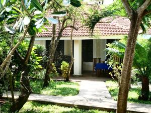 Zahrada ubytování Diani Cottages