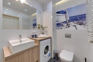 Et badeværelse på Apartamenty Apartinfo Aura