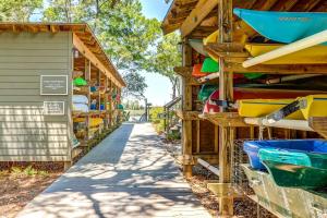 a row of buildings with surfboards on the side at Inlet Cove 12 in Kiawah Island