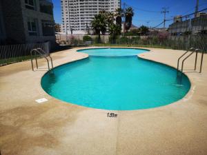 Bazén v ubytování Departamento Vista Herradura nebo v jeho okolí