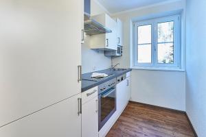 Kuchyň nebo kuchyňský kout v ubytování Hotel Gasthof Schweizerhaus