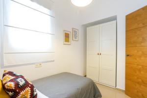 Postel nebo postele na pokoji v ubytování Apartamentos Diaber San Leandro