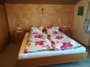 Łóżko lub łóżka w pokoju w obiekcie Ferienwohnung Angererhof