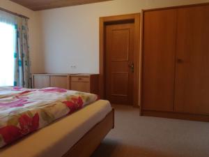 Łóżko lub łóżka w pokoju w obiekcie Ferienwohnung Angererhof