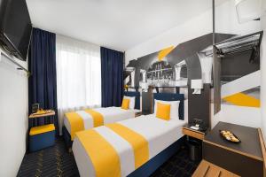 Voodi või voodid majutusasutuse D8 Hotel toas