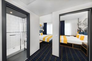 Voodi või voodid majutusasutuse D8 Hotel toas