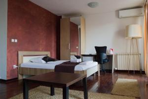 Postel nebo postele na pokoji v ubytování Vila Senjak + 37 fotografií