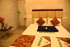 Postel nebo postele na pokoji v ubytování Rightchoicehotels