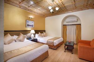 Letto o letti in una camera di Hotel Shanker-Palatial Heritage Kathmandu