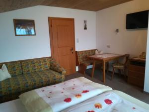 Łóżko lub łóżka w pokoju w obiekcie Ferienwohnung Angererhof