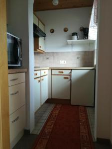 Kuchnia lub aneks kuchenny w obiekcie Ferienwohnung Angererhof