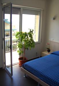 Postel nebo postele na pokoji v ubytování Albergo Riviera Spineta