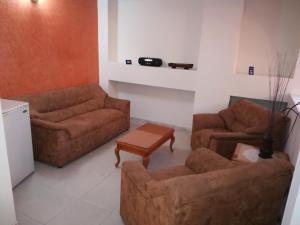 Posezení v ubytování HOTEL COSTA DEL SOL FUSAGASUGa