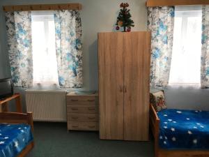 Postel nebo postele na pokoji v ubytování U Kapličky