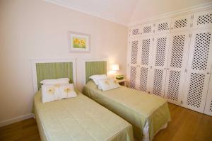 Ένα ή περισσότερα κρεβάτια σε δωμάτιο στο Apartamento Jarro +11 φωτογραφίες