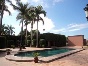 Swimming pool sa o malapit sa Hotel Hacienda Cazadores