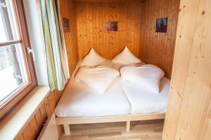 Posteľ alebo postele v izbe v ubytovaní Chalet Appartement Alpenherz