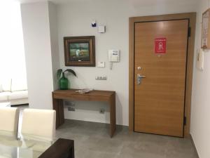 Televízia a/alebo spoločenská miestnosť v ubytovaní Villa Pepita