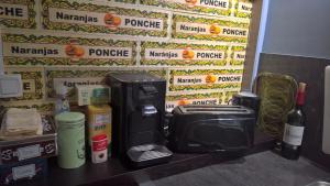 a room with a wall with signs on the wall at Bambou & Olivier Chambres in Roubaix