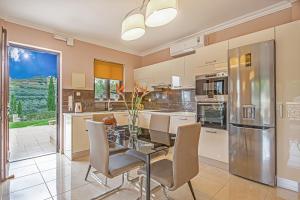 Kuchyň nebo kuchyňský kout v ubytování Casa Leone Suites
