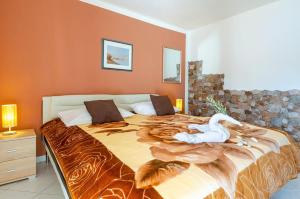 מיטה או מיטות בחדר ב-Villa Paradise