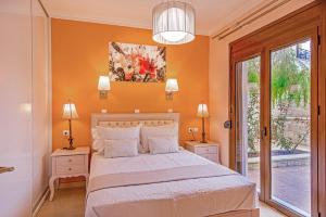 Postel nebo postele na pokoji v ubytování Casa Leone Suites