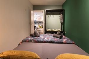 Ένα ή περισσότερα κρεβάτια σε δωμάτιο στο Zagreb Memories