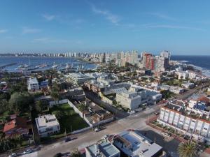 an aerial view of a city and the ocean at Atlántico Boutique Hotel in Punta del Este
