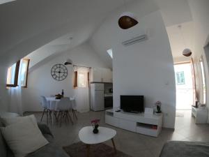 TV a/nebo společenská místnost v ubytování Apartment Vesna
