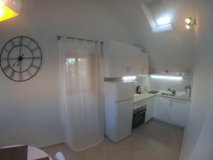 Kuchyň nebo kuchyňský kout v ubytování Apartment Vesna