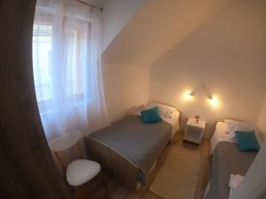 Postel nebo postele na pokoji v ubytování Apartment Vesna