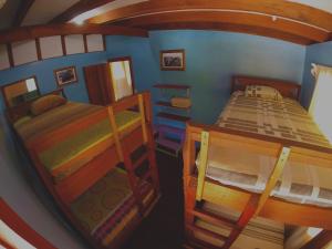 Llit o llits en una habitació de Hotel Maritza