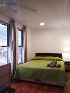 מיטה או מיטות בחדר ב-Complejo Costa Serena-Casas del Mar